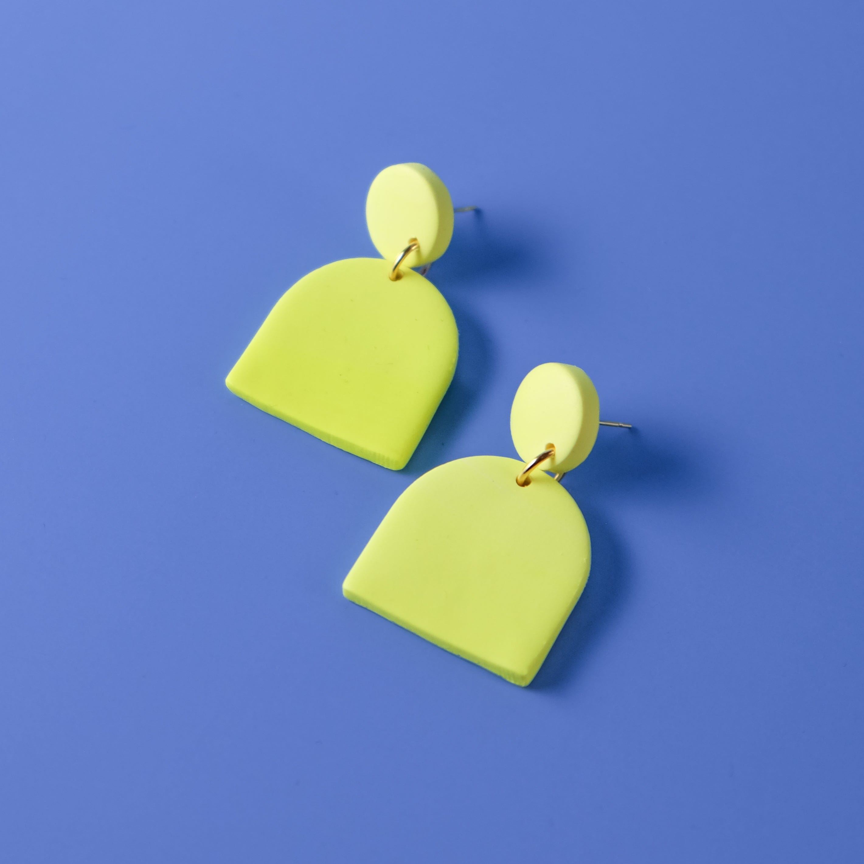 Fun and elegant dome-shaped Alexa Domes dangly earrings in neon yellow #color_neon-yellow