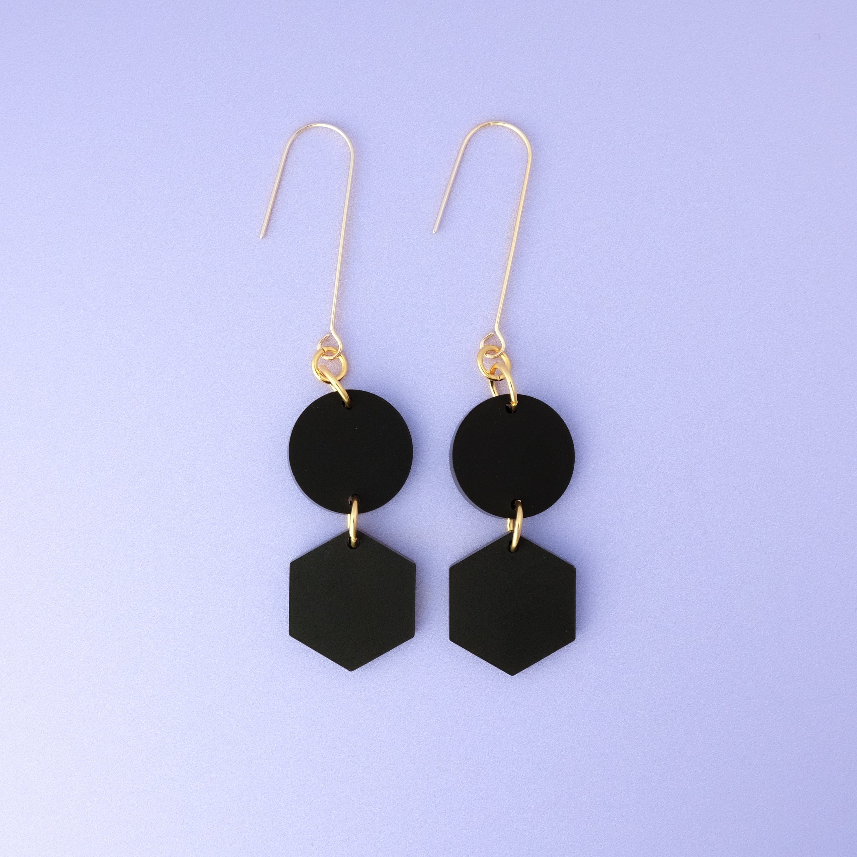 Elegant, elongated and lightweight Belle Dangles geometric dangly earrings in matte black #color_black