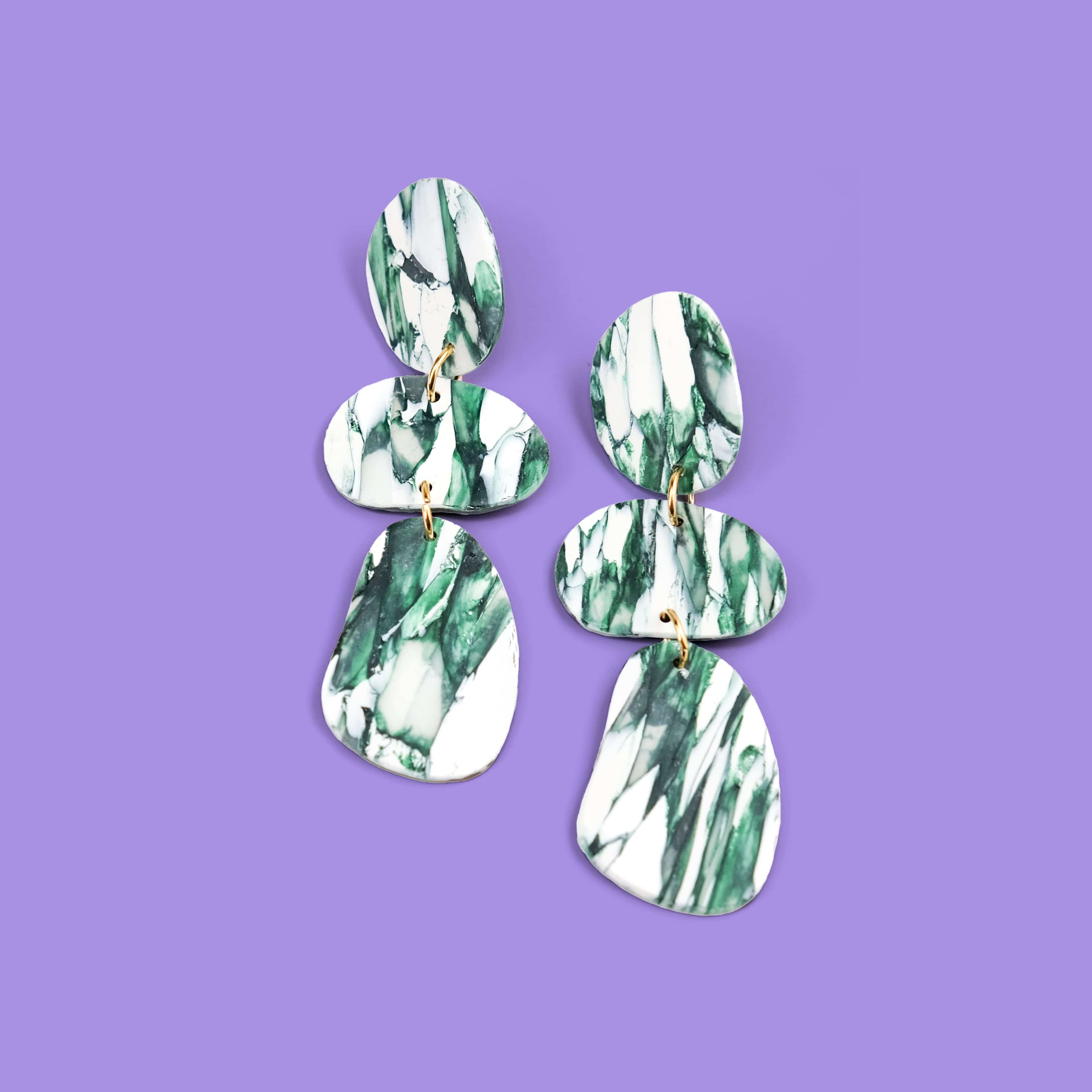 Elegant statement Celestia dangly earrings in italian marble pattern #color_forest-marble