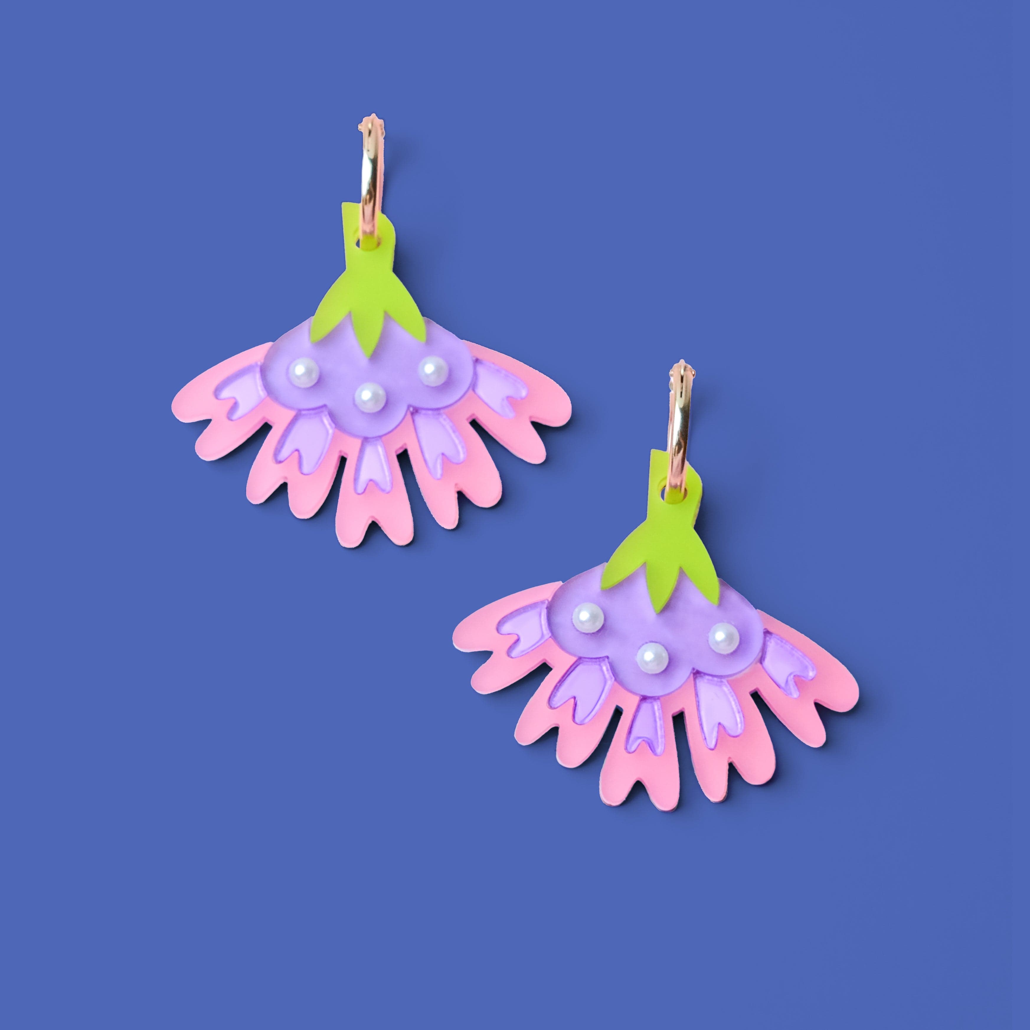 cosmos flower dangly hoop earrings in pink #color_pink