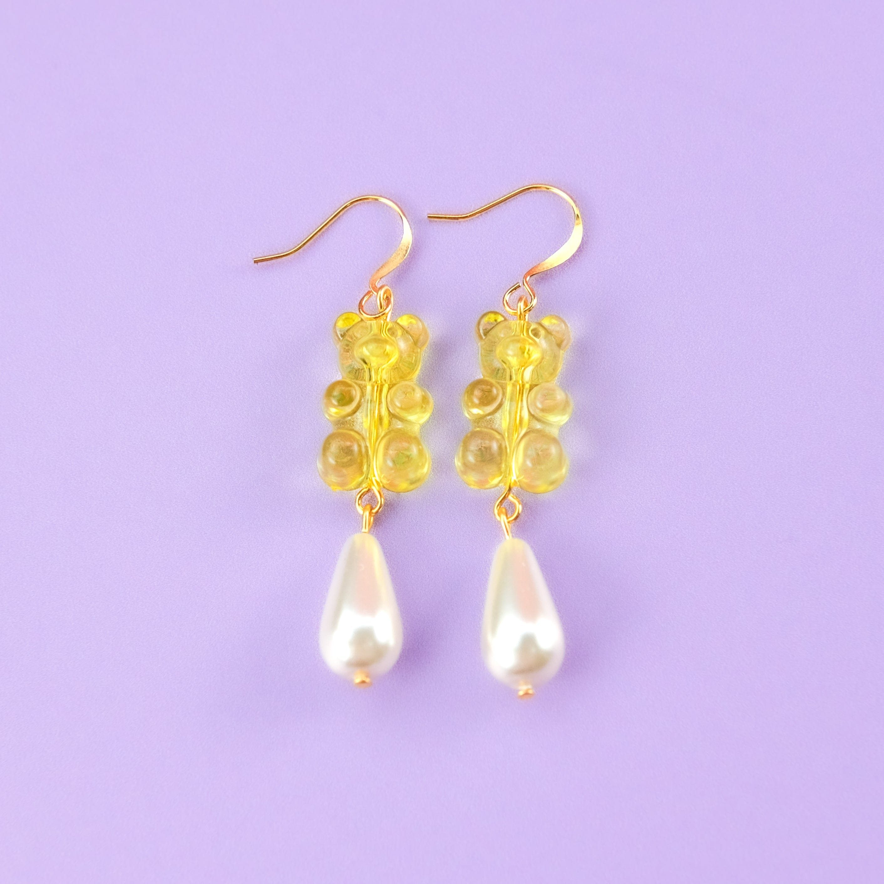 Nostalgic, cute and classy gummy bear dangly earrings with elegant pearl drops #color_yellow