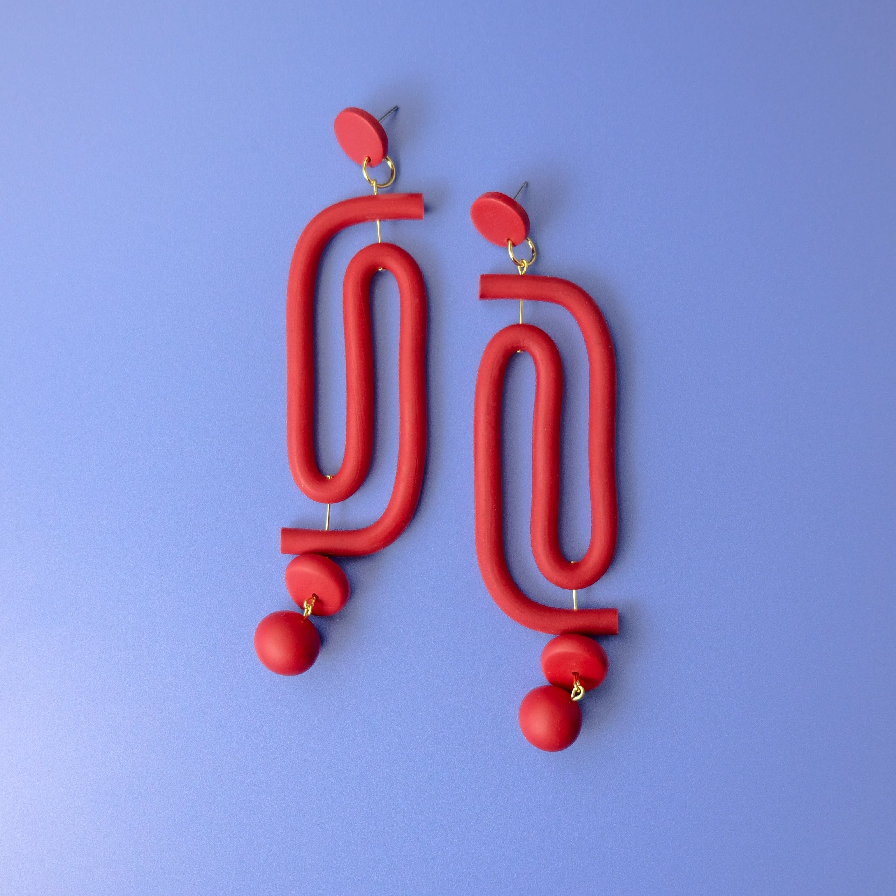 Labyrinth dangly statement earrings. A striking and unique earring for the bold and vibrant personality. Hand-made in NYC #color_red