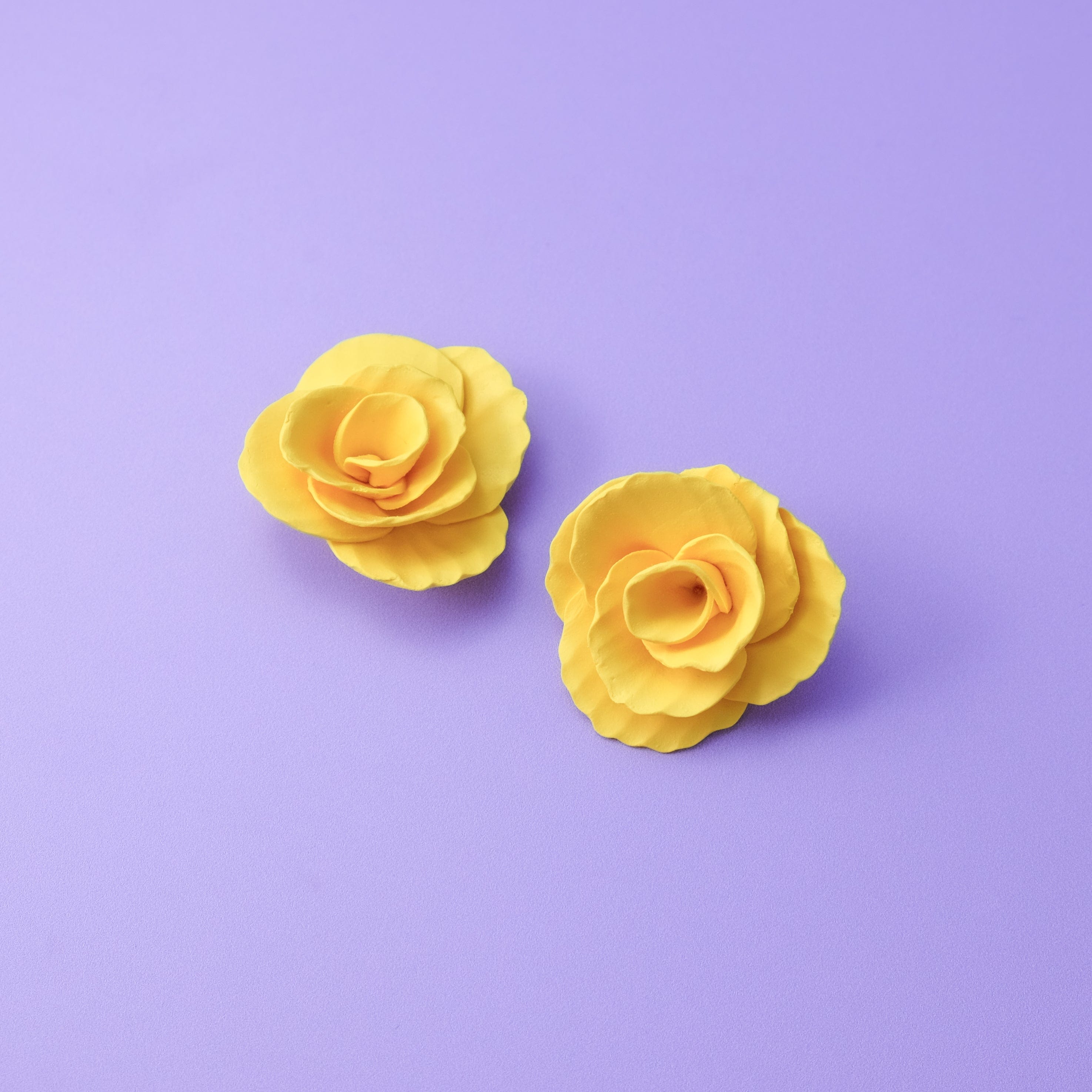 Hand-made statement flower rosette stud earrings in yellow #color_yellow