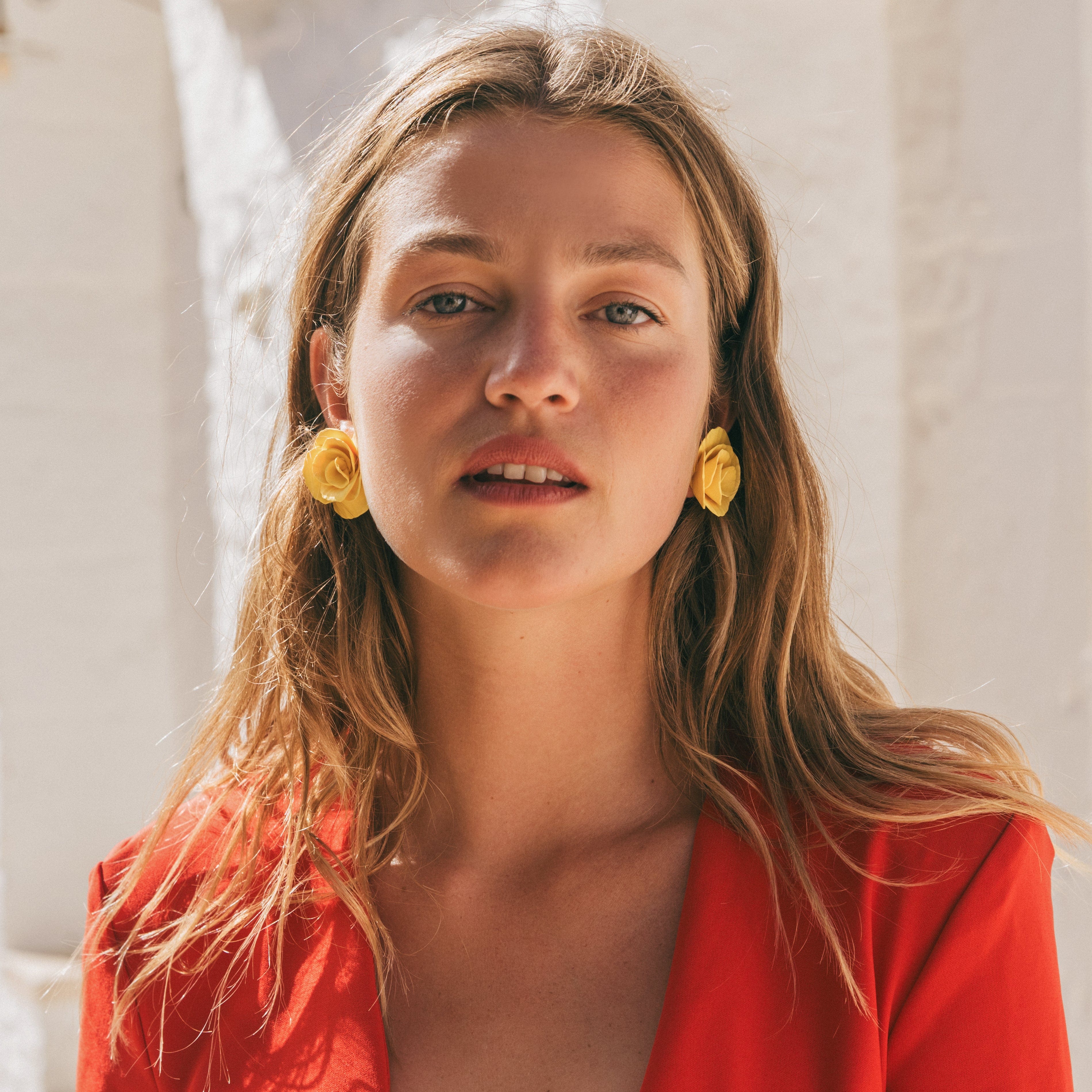 Hand-made statement flower rosette stud earrings in yellow #color_yellow