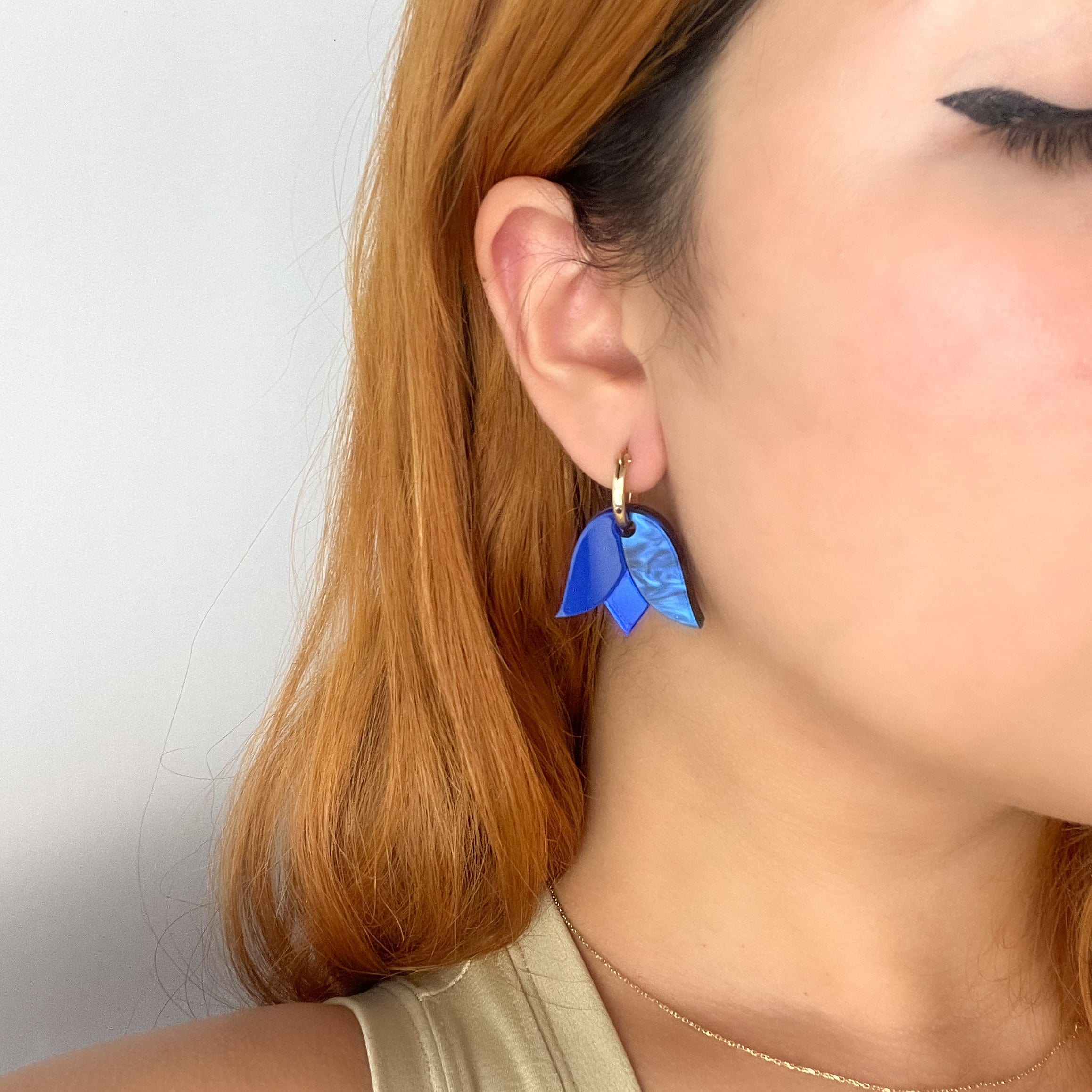 Cute and dainty Tulip flower gold-filled hoop earrings in blue #color_blue